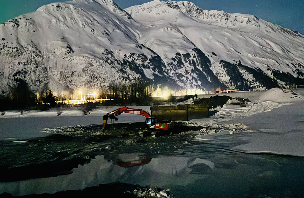 Northern lights excavator mountain scape