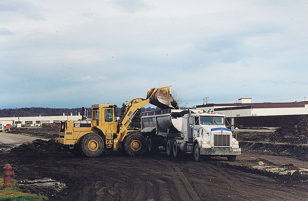Dozer loading a dump truck